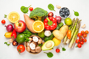 Healthy food assortment on white background.