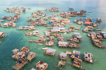 Aerial view of Borneo Sea Gypsy water village at Omadal Island, Semporna Sabah,