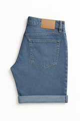 Light blue denim shorts with rolled cuffs and tan leather patch