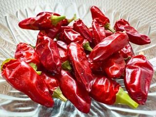 Dried Diavolicchio Calabrese red peppers in glass bowl