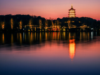 Fototapeta premium Night landscape of Leifeng pagoda,located at Xihu(west lake) at Hangzhou city,China