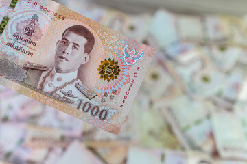 money banknote thai baht for background, pile of one thousand thai baht banknotes, savings money...