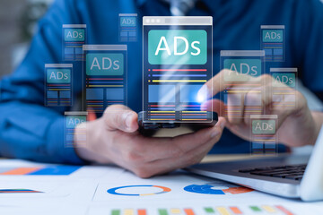 Businessman analyzing digital marketing and online advertising for target customers. Cross feed...