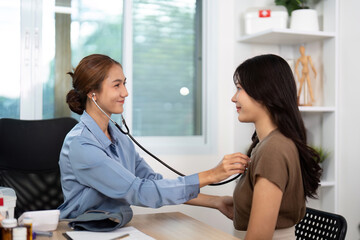 Doctor-Patient Interaction. Healthcare professional using stethoscope for patient examination.