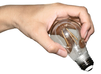 Hand holding a transparent light bulb fits with all kinds of backgrounds.