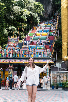 Female content creator posing at Batu Caves, Kuala Lumpur