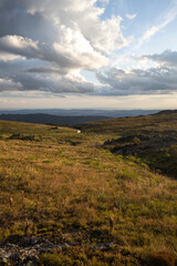 valley mountains river waterfall golden grass