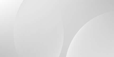 A minimalist abstract background featuring overlapping curves and circular shapes in various shades of gray, creating a smooth gradient and subtle depth