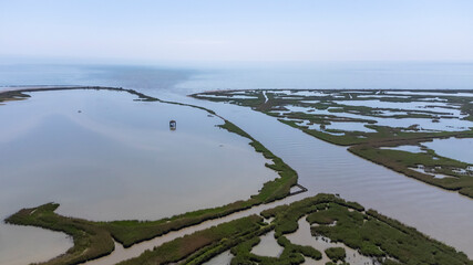 Porto Tolle is located between the Po di Maistra and Po di Gnocca rivers and is cut in half by the Po di Venezia (Parco regionale del Delta del Po)