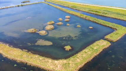 Porto Tolle is located between the Po di Maistra and Po di Gnocca rivers and is cut in half by the Po di Venezia (Parco regionale del Delta del Po)