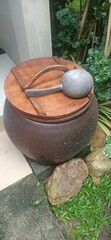 A clay pot for washing or rinsing feet.