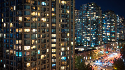 Urban Canyon Night City Street View High Rise Buildings Traffic Light Trails Downtown Metropolitan Skyline