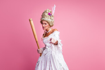 Fototapeta premium Historical costume woman combines vintage elegance with a humorous twist