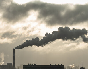 Factory chimney fumes emitting pollution to the atmosphere. Co2 and greenhouse gases emissions. The...