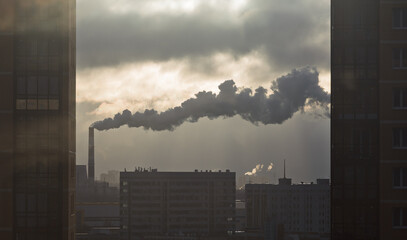 Factory chimney fumes emitting pollution to the atmosphere. Co2 and greenhouse gases emissions. The...