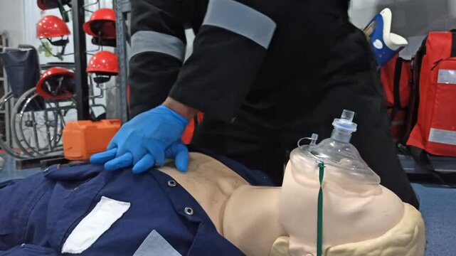 First aid cardiopulmonary resuscitation course using automated external defibrillator device, AED.