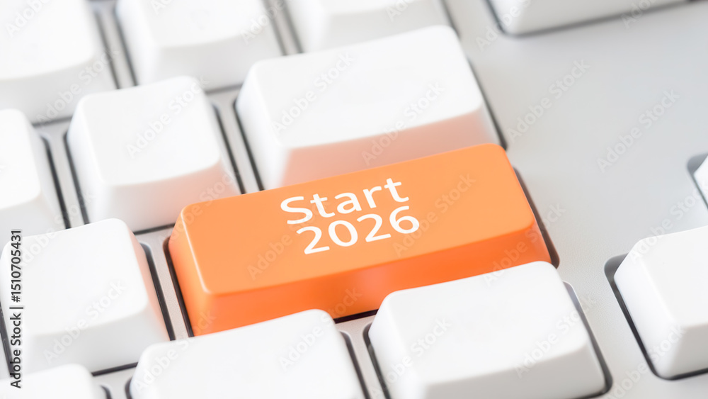 Poster bright orange start button on computer keyboard signifying new beginnings in 2026
