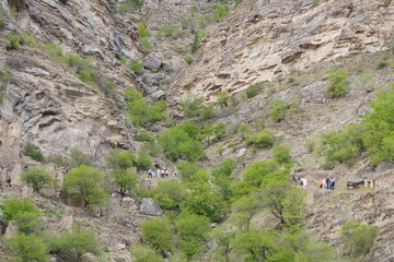 A group of tourists in a mountainous area.