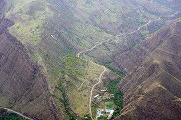 View of the road in the mountains stretching into the distance.