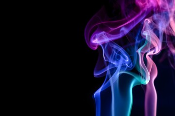 Obraz premium Abstract colorful smoke trails against a dark background for creative design