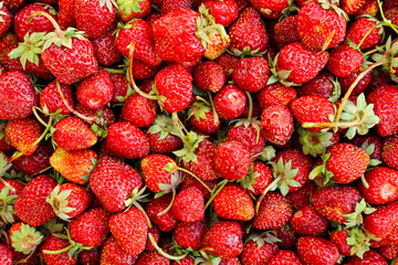 Background ripe juicy strawberries close-up