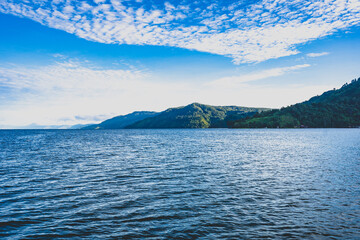 Lake Toba is the world’s largest volcanic lake, located in North Sumatra, Indonesia. Formed by an...