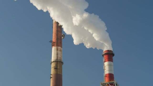Smoking chimneys of a coal power plant