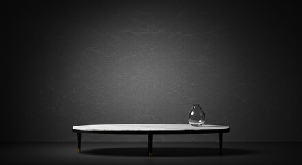 Elegant glass vase on a marble table against a dark textured wall