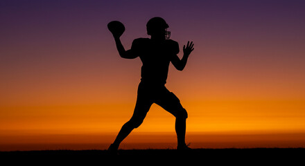 Silhouette of a football player throwing a ball against a vibrant sunset background in outdoor setting