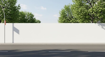 City street with long concrete wall featuring copy space and mockup
