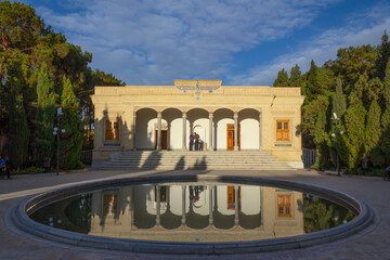 The Zoroastrian Fire Temple in Yazd, Iran, with its iconic Faravahar symbol under a dramatic sky, a sacred place preserving ancient Persian spiritual heritage.
