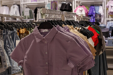 Fototapeta premium Casual clothes. The mall offers a large selection of modern shirts.