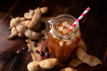 Tamarind drink. Agua de Tamarindo, is one of the traditional "Aguas Frescas" in Mexico. Infused drink made with tamarind to which beneficial health properties are attributed.
