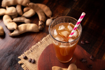 Tamarind drink. Agua de Tamarindo, is one of the traditional "Aguas Frescas" in Mexico. Infused drink made with tamarind to which beneficial health properties are attributed.