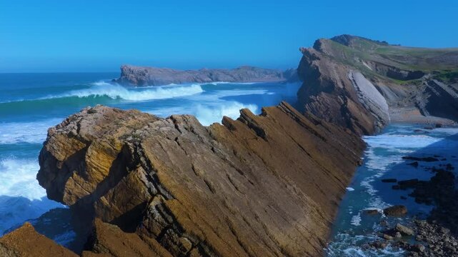 Waves on the cliffs of Madero Beach in the Dunes of Liencres Natural Park. Liencres, Pi&eacute;lagos Municipality, Costa Quebrada Geopark, Cantabrian Sea, Cantabria, Spain, Europe