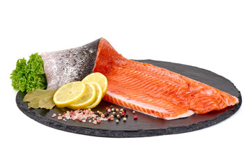 Fresh Salmon Fillet with Lemon, Spices and Greens on Slate Plate, Isolated on White Background.