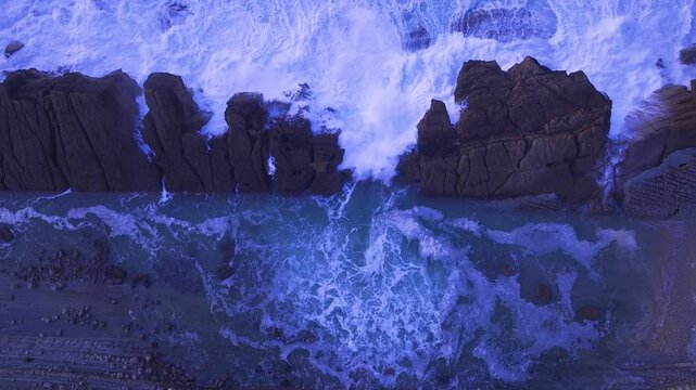 Aerial view of the sunset lights on the cliffs of Madero Beach in the Dunes of Liencres Natural Park. Pi&eacute;lagos Municipality, Costa Quebrada Geopark, Cantabrian Sea, Cantabria, Spain, Europe