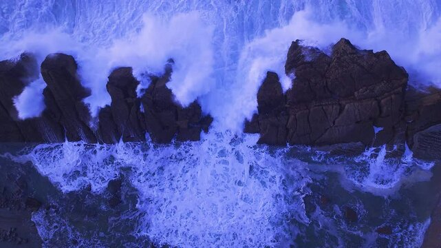 Aerial view of the sunset lights on the cliffs of Madero Beach in the Dunes of Liencres Natural Park. Pi&eacute;lagos Municipality, Costa Quebrada Geopark, Cantabrian Sea, Cantabria, Spain, Europe