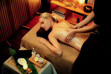 Caucasian woman customer enjoying relaxing anti-stress spa massage and pampering with beauty skin...