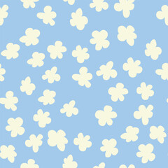 Decorative seamless vintage pattern in classic style with small flowers, ditsy. Silhouettes of flowers, Two-color ornament in pastel colors