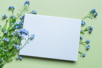 Greeting 5x7 card design with blue forget-me-not flowers