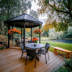 Cozy outdoor gazebo patio dining area with hanging flower baskets overlooking tranquil lake view perfect for garden entertaining and lifestyle photography blog posts