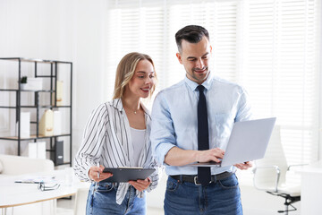 Marketing. Two colleagues working together in office