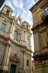 Baroque facade of the Church of the Holy Trinity on a main street in Catania, Sicily, Italy