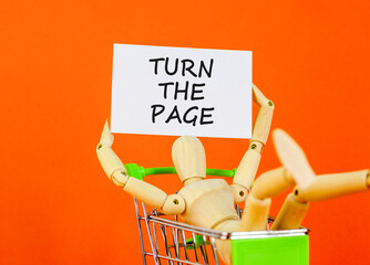 Turn the page symbol. Concept words Turn the page on beautiful white card. Beautiful orange...