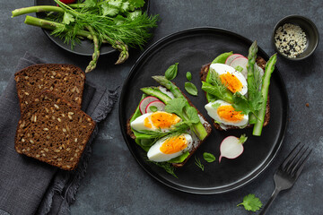 toast with dark rye bread asparagus and soft boiled egg