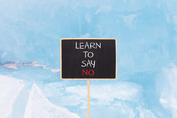 Learn to say no symbol. Concept words phrase Learn to say no on beautiful black blackboard....