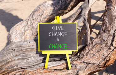 Give change a chance symbol. Concept words phrase Give change a chance on beautiful black...