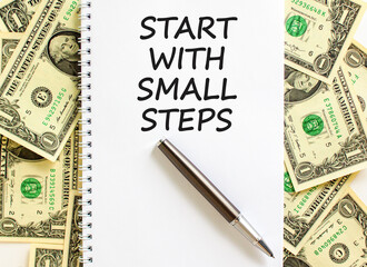 Start with small steps symbol. Concept words phrase Start with small steps on beautiful white note....