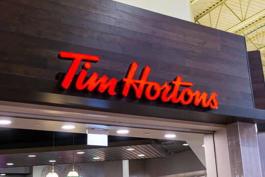 Sign of Tim Hortons, Canada's largest coffeehouse and restaurant chain that serves coffee, donuts, sandwiches, breakfast and other fast-food items